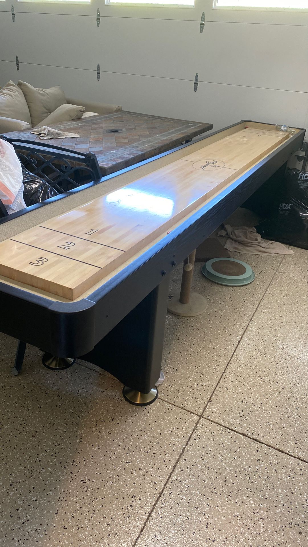 Shuffleboard table. Like brand new. Hardly used. Downsizing in house size and have no space