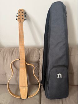 Natasha smart travel guitar