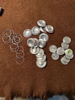 Aluminum top, bottoms and rings from soda cans