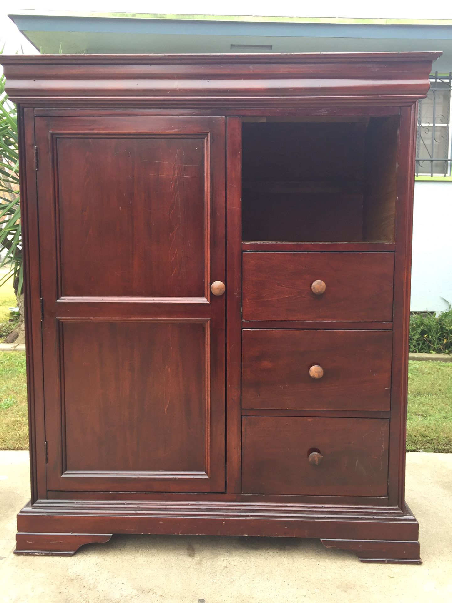 Cabinet with shelf and three drawers in good condition.