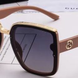Beige Gucci sunglasses