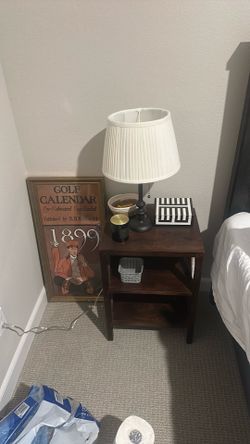 2 night stands, 2 lamps, and the poster