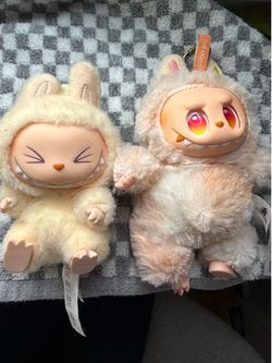 Left Authentic Labubu. Right Fake Labubu