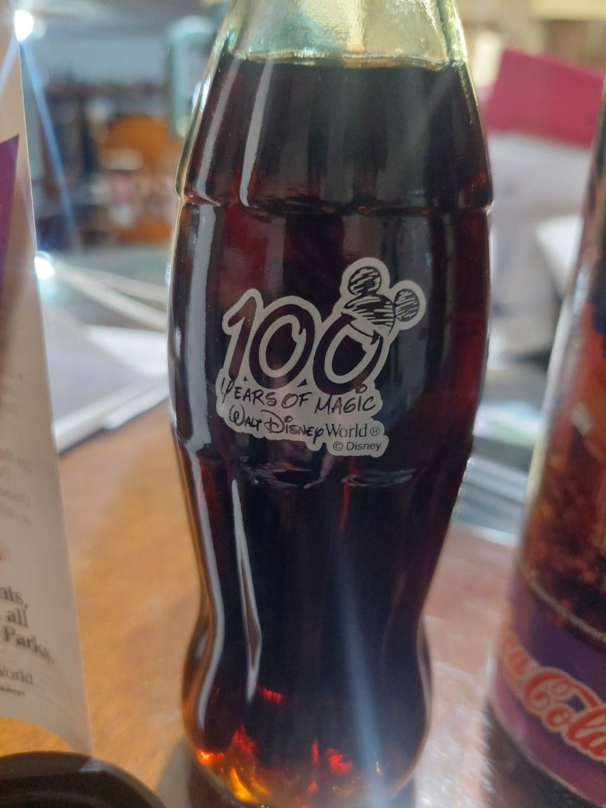 100 year of Disney. Coca-Cola bottle.