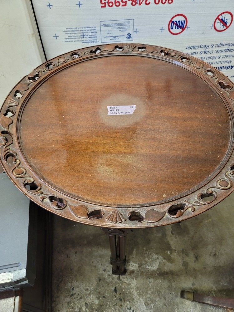 Round ornate Antique Table.
26.75w X 28h