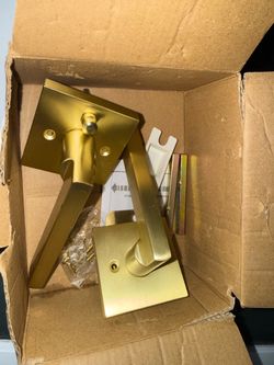 Brushed brass modern door levers