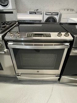 GE stainless steel electric stove; includes a receipt for a 60-day warranty.