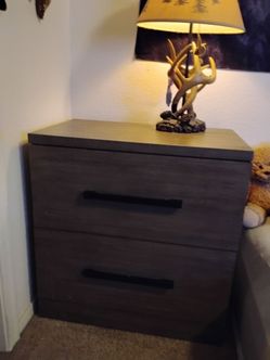 Set of two hardwood nightstands with cloth bottom drawers and USB charging ports