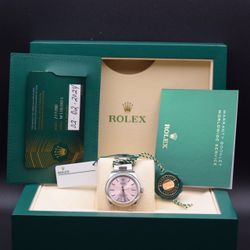 2024 Rolex Oyster Perpetual 277200 with pink dial (31mm).