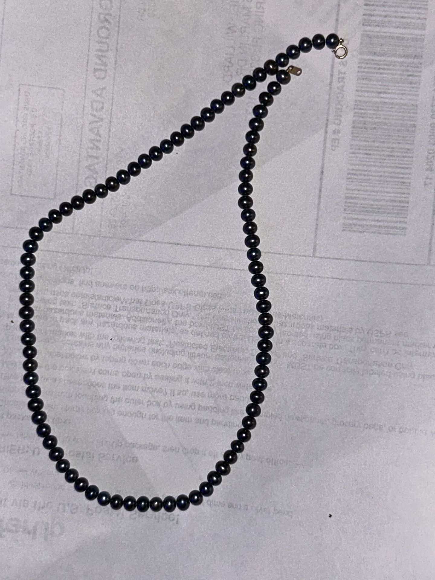 14 karat yellow gold 16 inch black pearls necklace