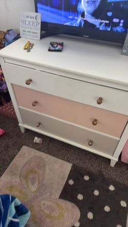 Pink and white kids dresser
