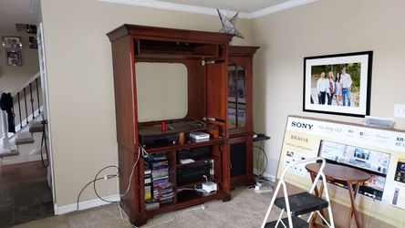 Woodley’s Solid Wood 4-Piece Entertainment Center