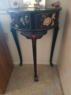 Orential black lacquered half moon console table