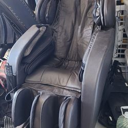 Massage Chair Works Well.  Scuffed And A Wear On Fabric