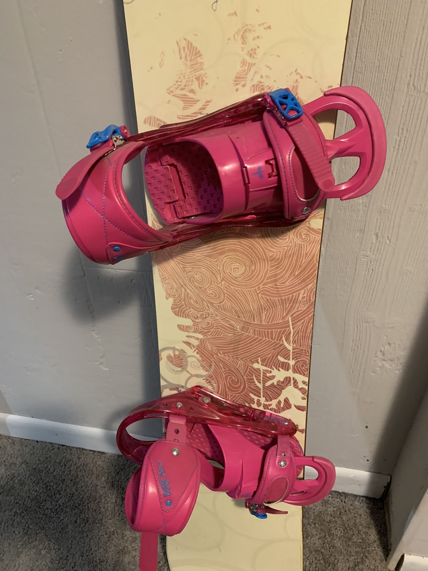 Pink Burton Bindings And Snowboard