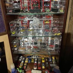 Slot cars 107 + 4 tcr cars + 35 bigger scale slot cars + track