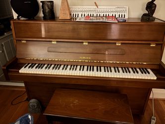 Yamaha Full Size Piano tuned last year