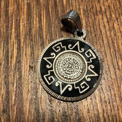 Aztec calendar, pendant, sterling silver black enamel