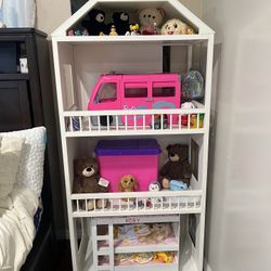Tall Doll House With A Lot Of Toys 