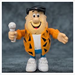 Vintage 1991 Hanna-Barbera Fred Flintstone Action Figure with Microphone