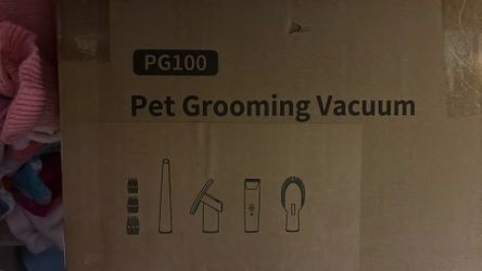 Pet grooming vacuum