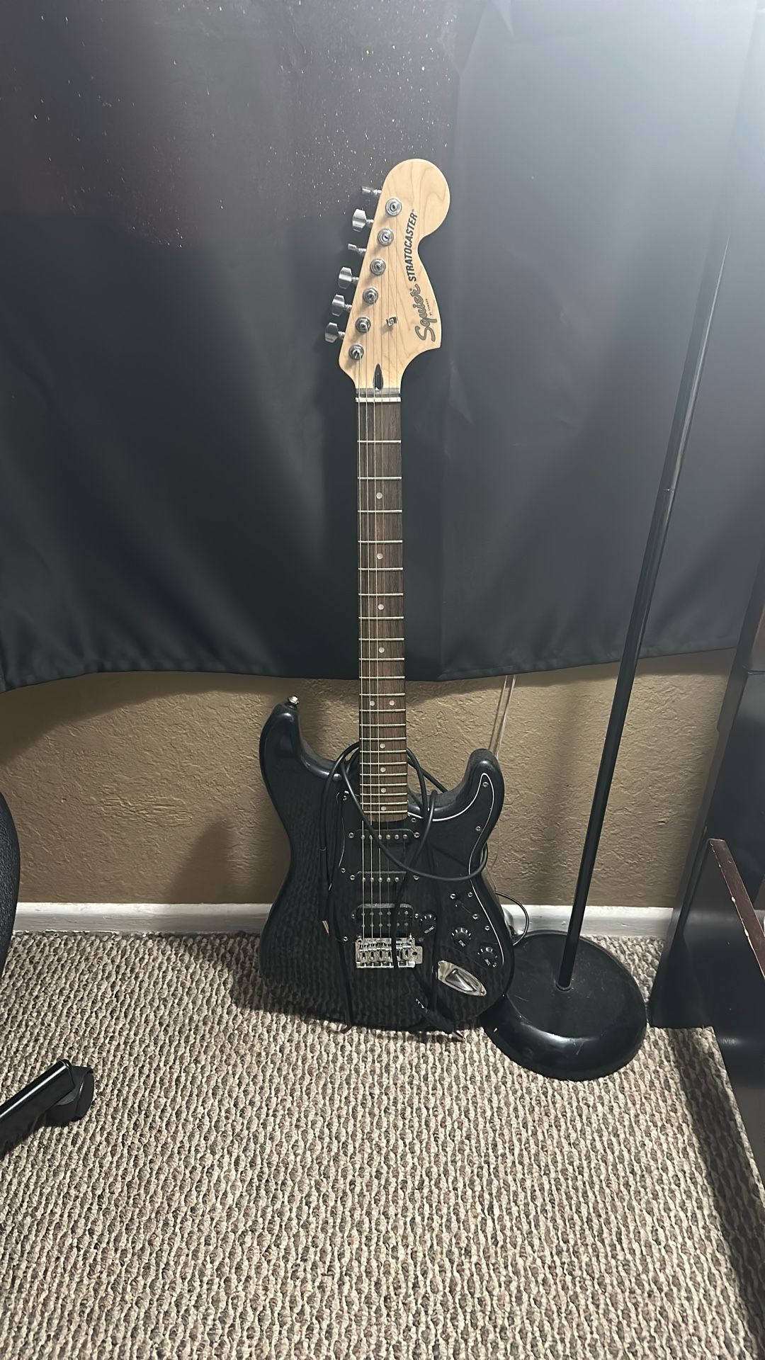 squier stratocaster electric guitar