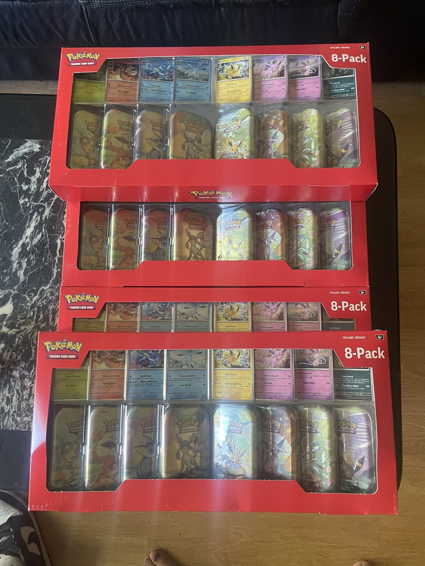 Pokemon Prismatic Evolutions Mini Tins 8 Pack