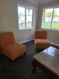 4 orange chairs
