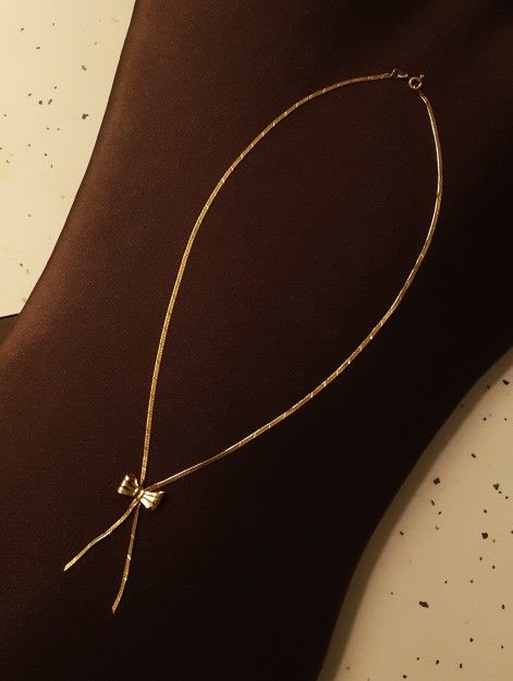 Herringbone 14 Kt Yellow Gold Bow Necklace