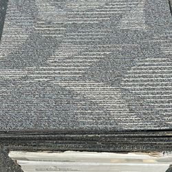 19” x 19” carpet squares approximately 300 ft.²