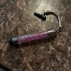 A phone pen with purple diamonds in it fake
