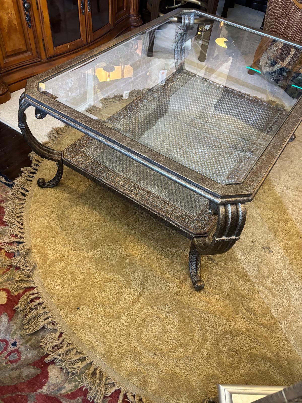 Metal and glass coffee table… with beveled glass… 47” wide , 34” depth , 20” high . $175