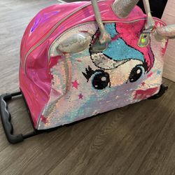 Little Girl Rolling Suitcase