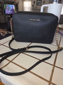 Used Michael kours purse