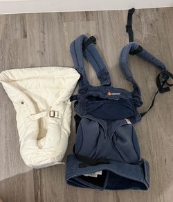 Ergobaby baby carrier with infant insert