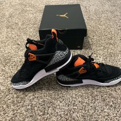 Jordan Spizike Low "Halloween" sneakers in the Black/Starfish Orange colorway. 