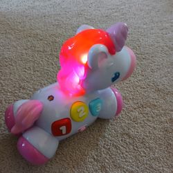 Bright Starts Rock And Glow Univmcorn Toy