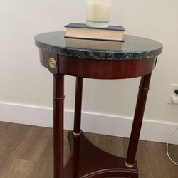 A Bombay Co. French Empire Neoclassical mahogany and marble side table.