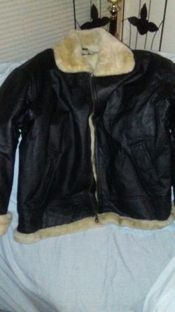 Leather coat with fur inside