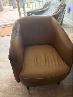 Leather chair,  available  $0