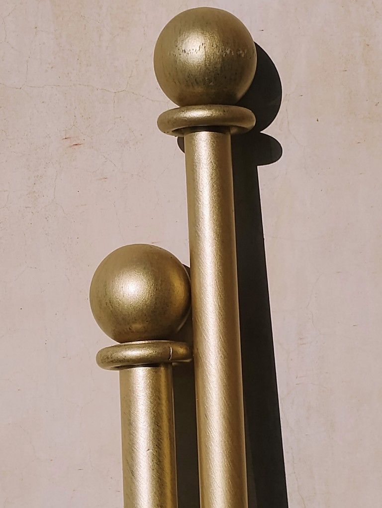 Gently worn brushed gold painted metal curtain rod 10.5 ft