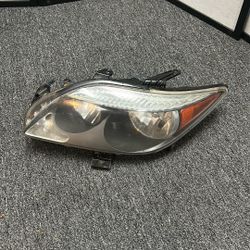 2005 -2007 Scion tC left drivers headlight black background OEM 100-78260