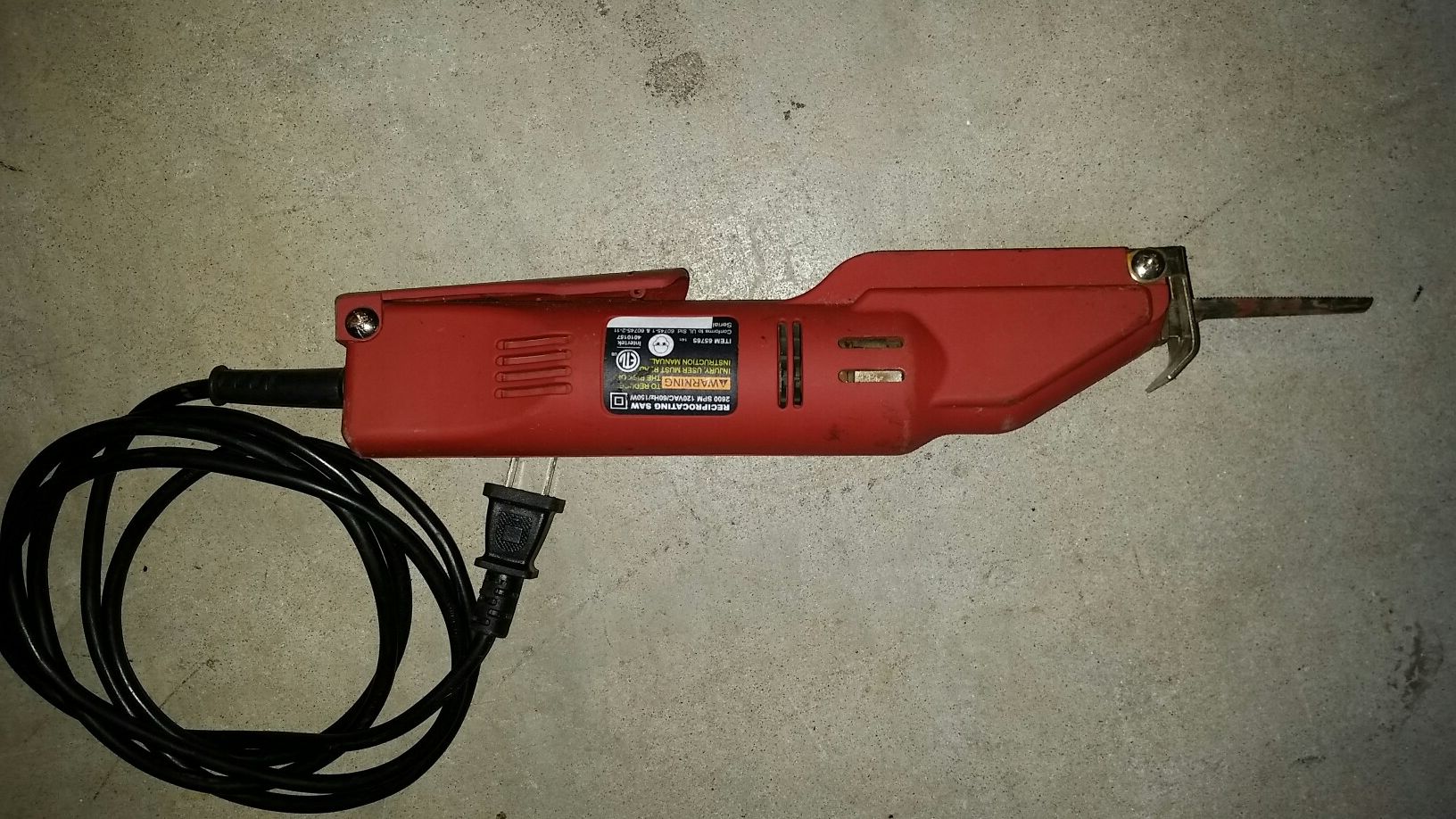 Miniature electric powered reciprocating saw