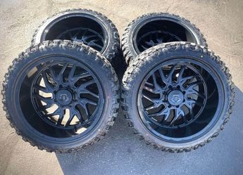 22X12 TIS 544GLOSS  BLACK WHEELS RIMS W/33125022 Tires For CHEVY GMC FORD 6X139.7-WE FINANCE
