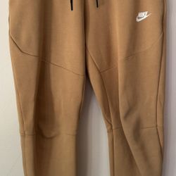 Sell brown Nike Tech Fleece pants - M size