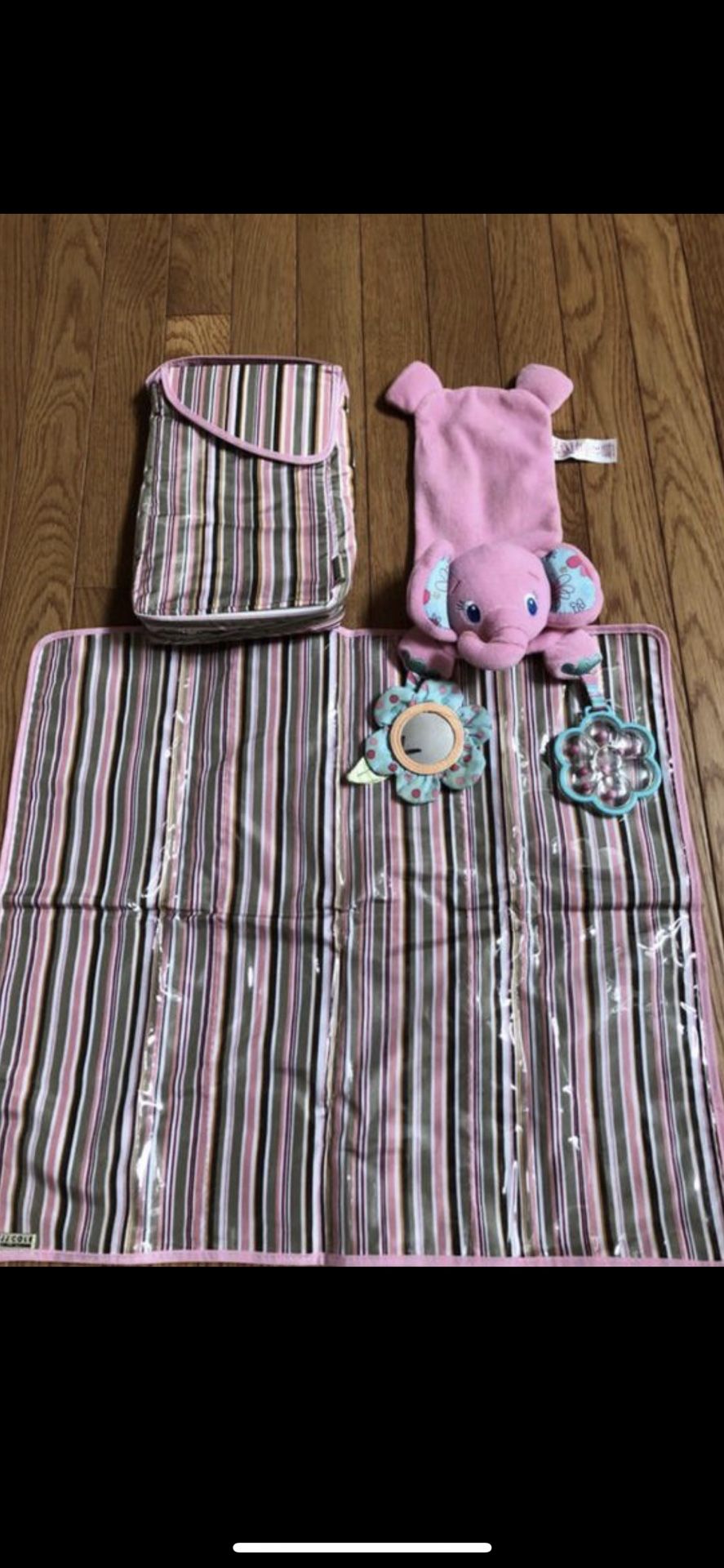 Changing pad with holder and car seat toy smoke and pet free