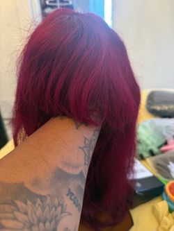 Burgundy human wig wit bangs