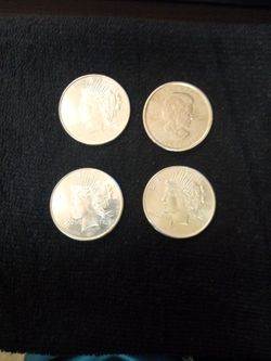 Silver Round Eagle And Maple One Ounce Coins