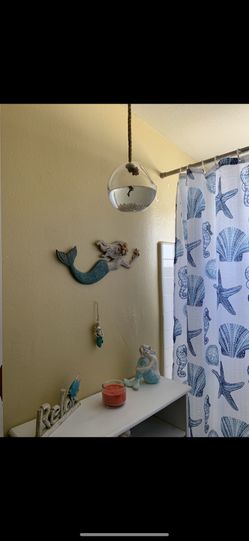 Handmade fish bowls with a real fish