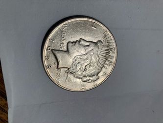 1928–s silver Peace dollar